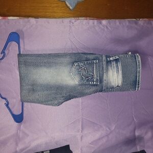 Brand new jeans with horse design on back pocket I just d9nt like the way they f